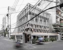 perforated metal veil by KHOA VU transforms old vietnamese villa into breathable restaurant