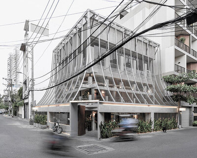 perforated metal veil by KHOA VU transforms old vietnamese villa into breathable restaurant