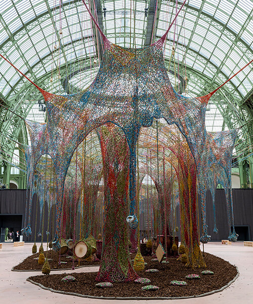 ernesto neto weaves organic multi-sensory installation within the grand palais in paris