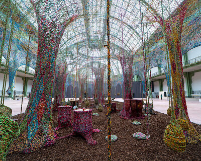 ernesto neto weaves organic multi-sensory installation within the grand palais in paris