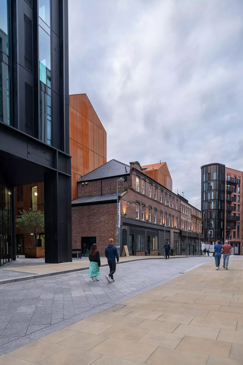 feilden clegg bradley weaves past and future into sheffield’s layered urban transformation