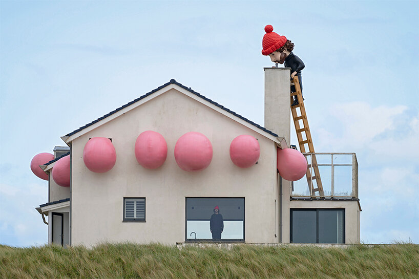 frankey blows giant bubble that breaks through windows in latest rooftop sculpture