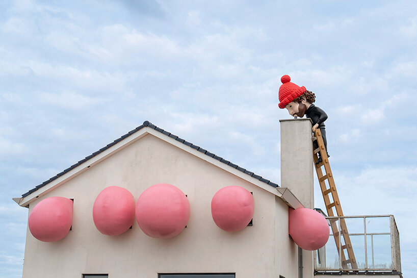 frankey blows giant bubble that breaks through windows in latest rooftop sculpture
