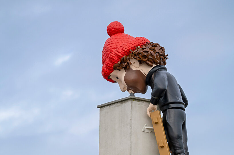 frankey blows giant bubble that breaks through windows in latest rooftop sculpture