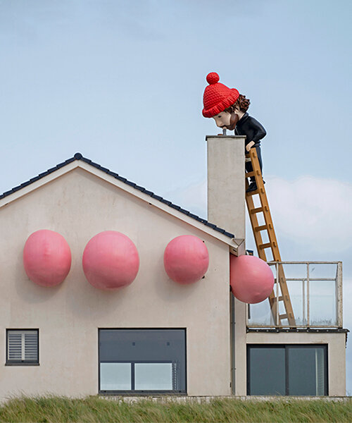 frankey blows giant bubble that breaks through windows in latest rooftop sculpture