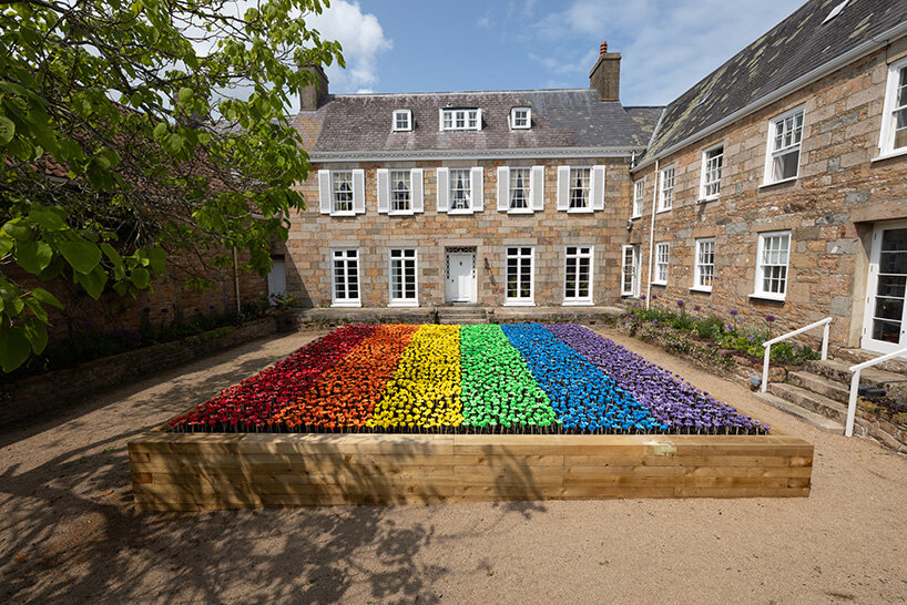 glowing meadow of 3D printed flowers by stuart semple takes over jersey zoo in the UK