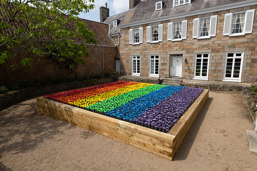 glowing meadow of 3D printed flowers by stuart semple takes over jersey zoo in the UK