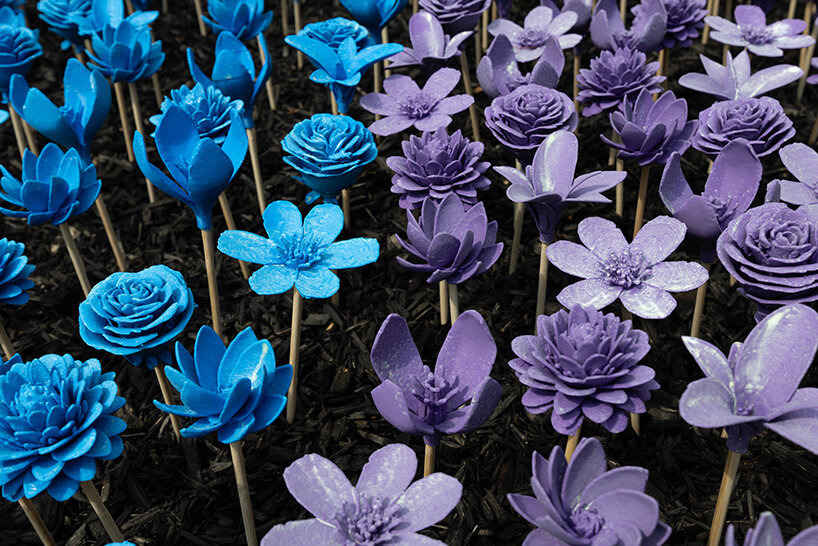 glowing meadow of 3D printed flowers by stuart semple takes over jersey zoo in the UK