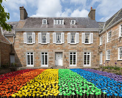 glowing meadow of 3D printed flowers by stuart semple takes over jersey zoo in the UK