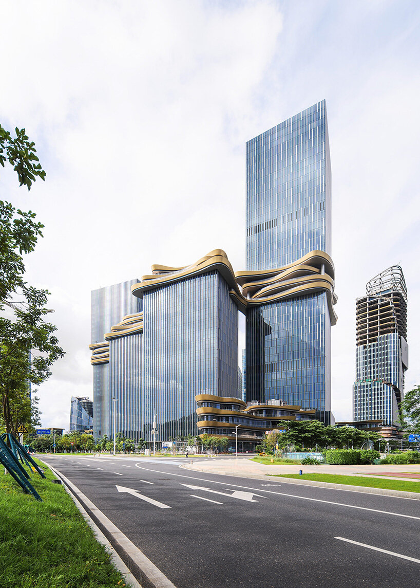 golden bridge by aedas joins towers with its looping shape