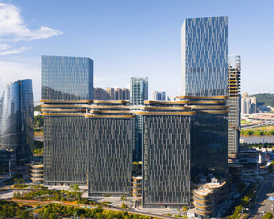 golden sky bridge by aedas stitches together towers with its looping shape in china
