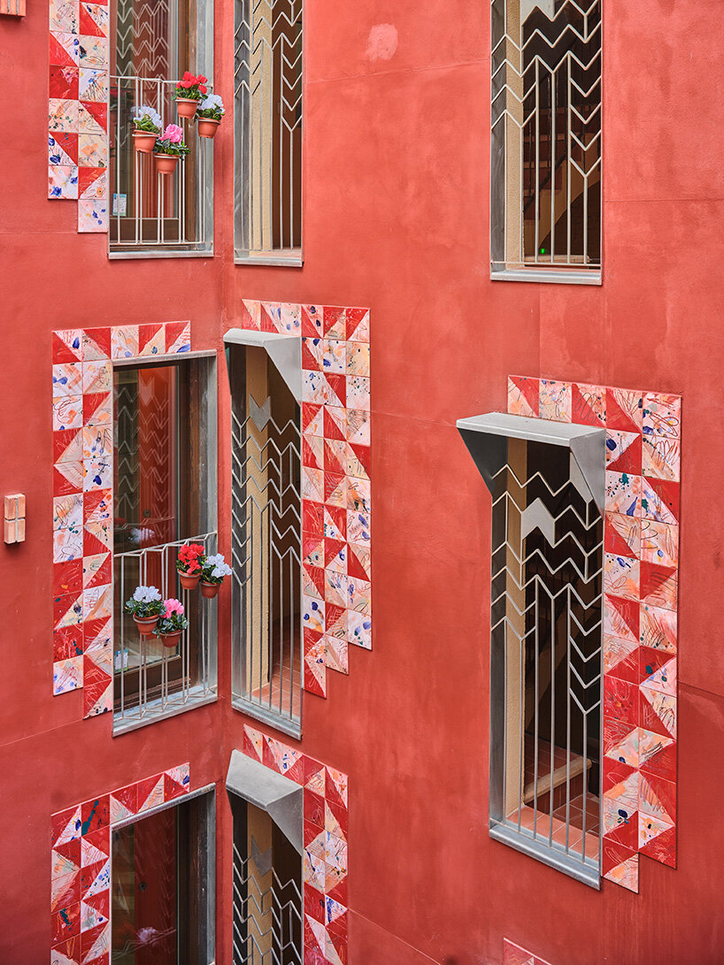 ceramic tiles tell stories of barcelona's residents in restored social housing by MIAS architects
