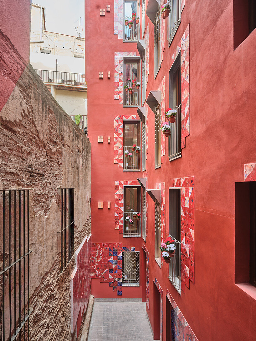 ceramic tiles tell stories of barcelona's residents in restored social housing by MIAS architects