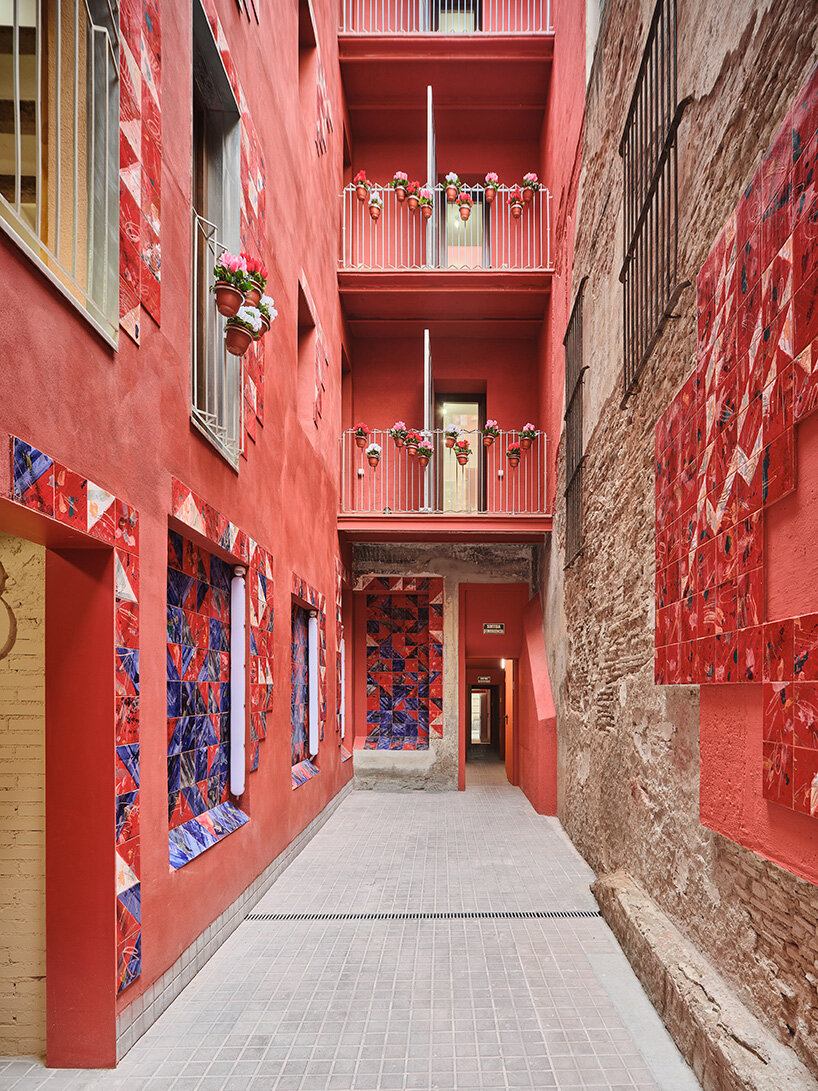 ceramic tiles tell stories of barcelona's residents in restored social housing by MIAS architects