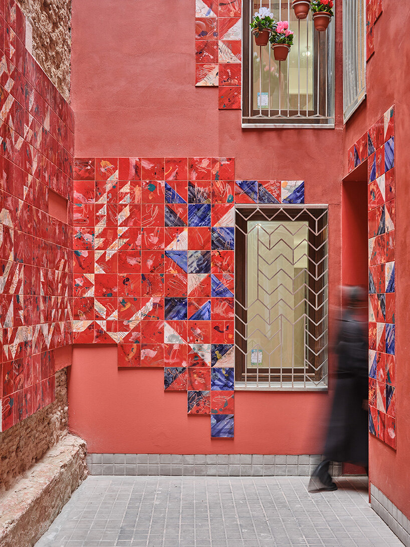 ceramic tiles tell stories of barcelona's residents in restored social housing by MIAS architects
