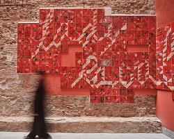 ceramic tiles tell stories of barcelona's residents in restored social housing by MIAS architects