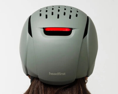 headfirst's self-adjusting bike helmet has brake light that glows when the rider slows down
