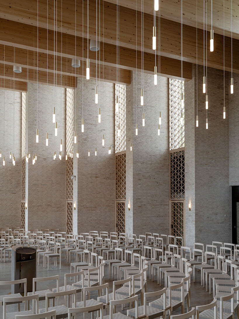 henning larsen builds brick-clad church in denmark as open pavilion for gathering
