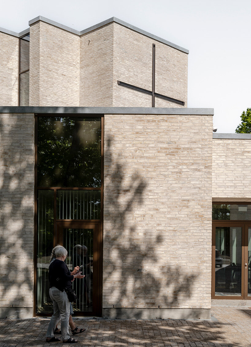 henning larsen builds brick-clad church in denmark as open pavilion for gathering
