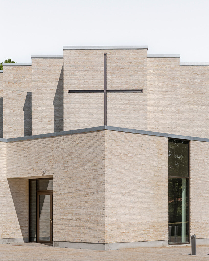 henning larsen builds brick-clad church in denmark as open pavilion for gathering