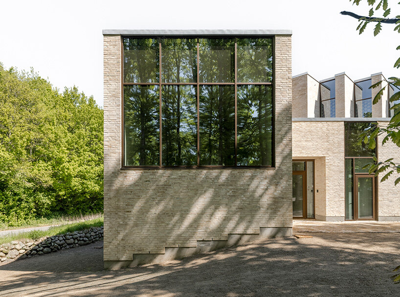 henning larsen builds brick-clad church in denmark as open pavilion for gathering