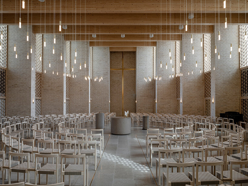 henning larsen builds brick-clad church in denmark as open pavilion for gathering