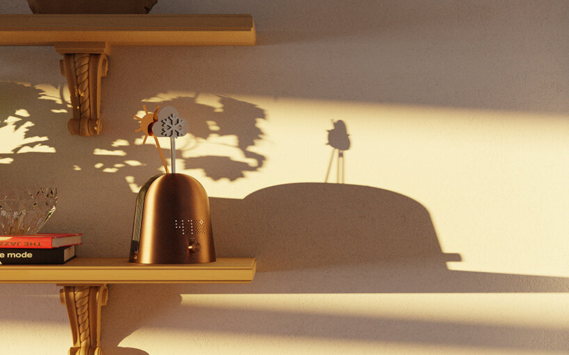 kinetic device by gustav rosén reflects sky conditions with metal weather symbols