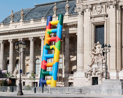 paola pivi leans 20-meter technicolor ladder against the grand palais in paris