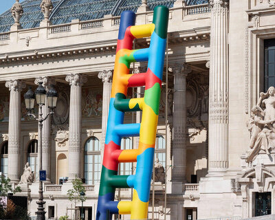 paola pivi leans 20-meter technicolor ladder against the grand palais in paris