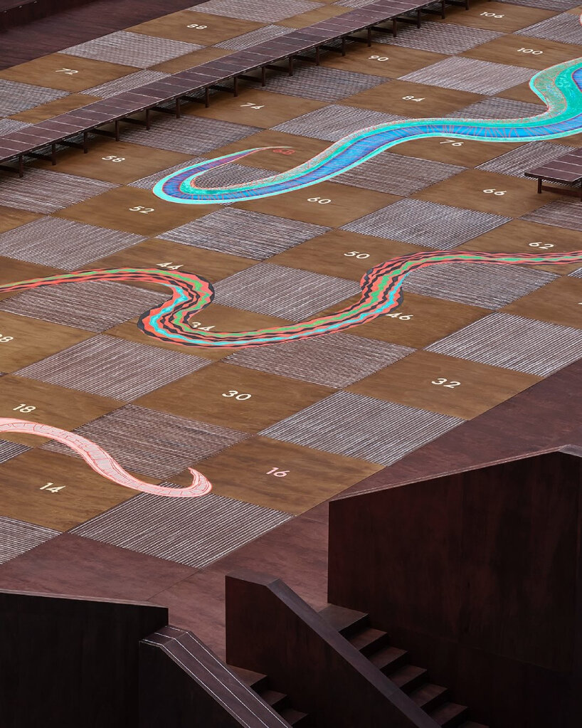 giant snakes and ladders board by bijoy jain backdrops louis vuitton's menswear show in paris