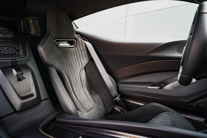 for the seats, the design team uses black leather and black Alcantara