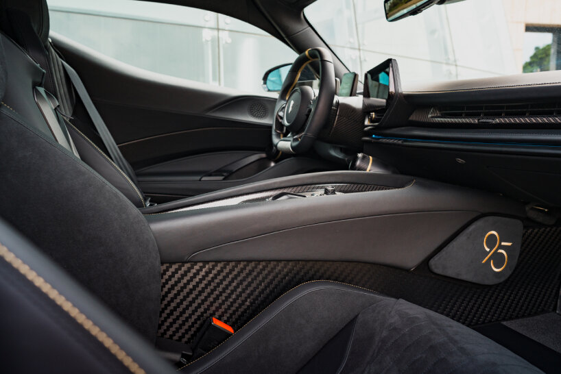 even the knee pads use black Alcantara, and they bear the logo ‘95’