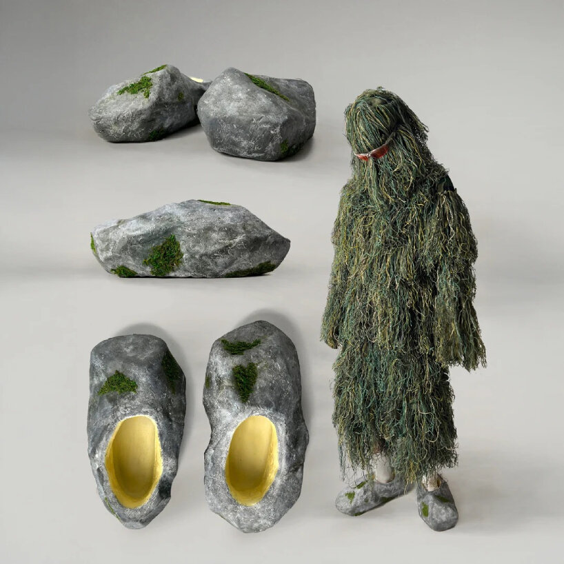 the design teams handpaints the realistic-looking moss around the footwear