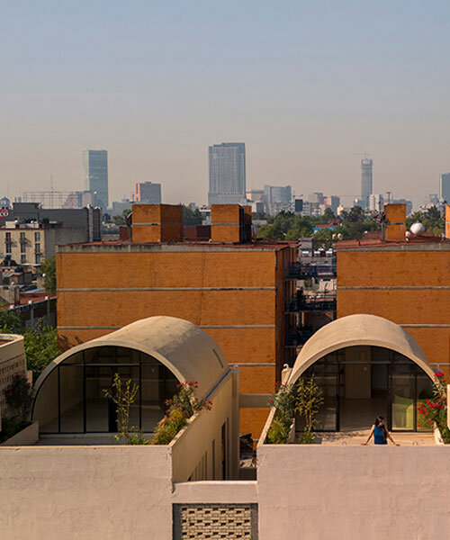 four barrel vaults outline residential complex by bloqe arquitectura in mexico city