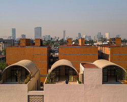 four barrel vaults outline residential complex by bloqe arquitectura in mexico city