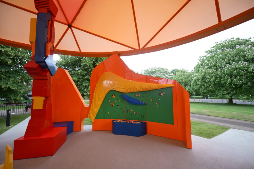 inside, there's a board where visitors can pin the LEGO bricks