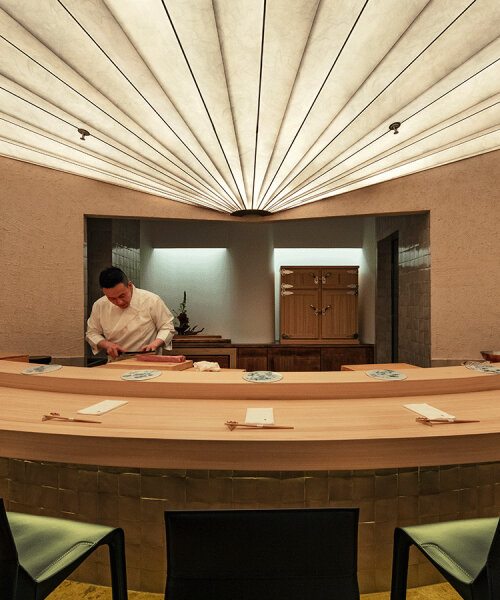 washi-textured ceiling fans across uchida shanghai's restaurant in china