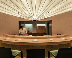 washi-textured ceiling fans across uchida shanghai's restaurant in china