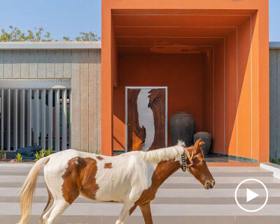 linear, unbroken wall encloses weekend villa by maanchitra in rural india