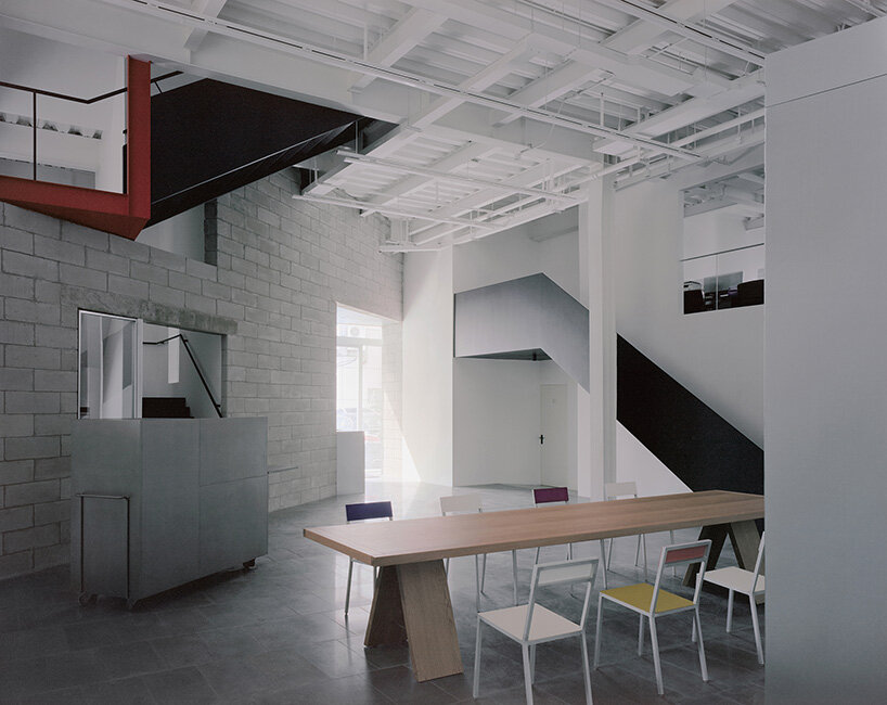 The bent inclined meeting room The Shanghai Office Revamp by Workshop Siyu