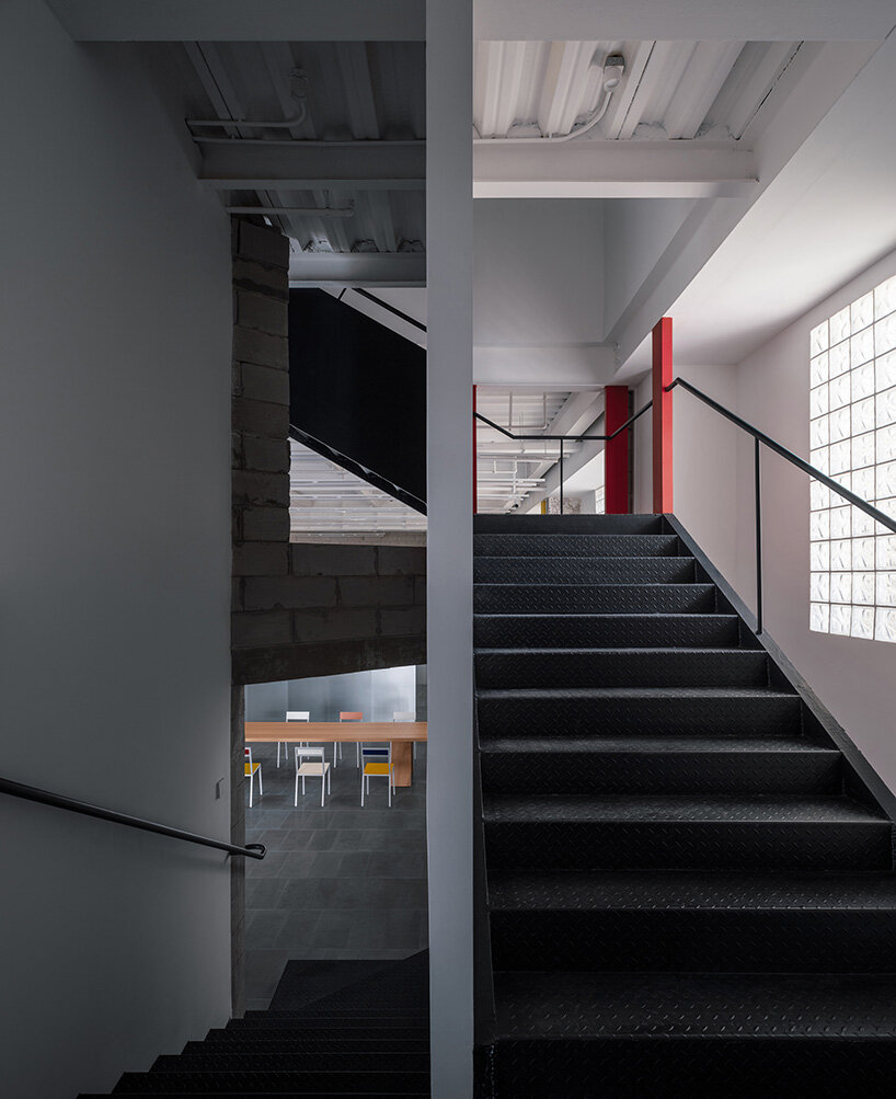skewed meeting room bends the grid in shanghai office revamp by atelier siyu