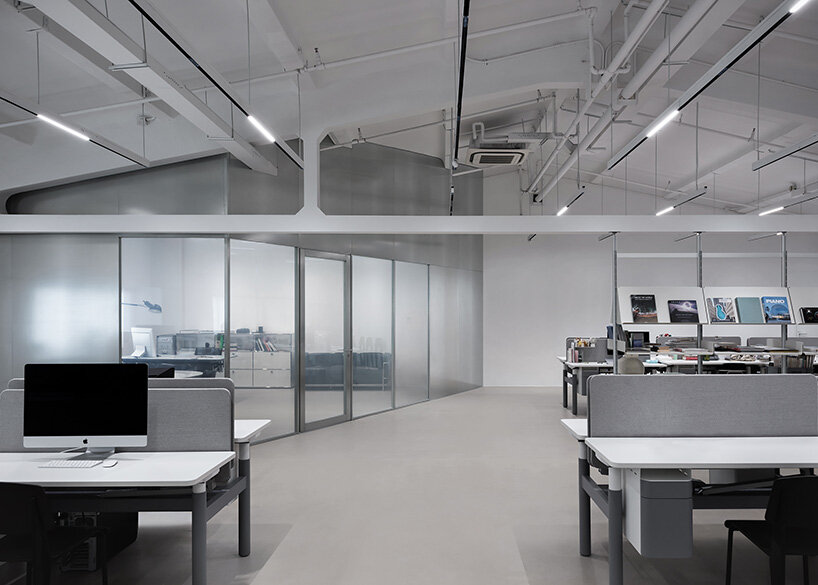 skewed meeting room bends the grid in shanghai office revamp by atelier siyu