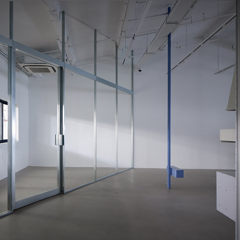 skewed meeting room bends the grid in shanghai office revamp by atelier siyu