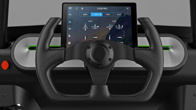 The steering wheel next to the digital screen for controls