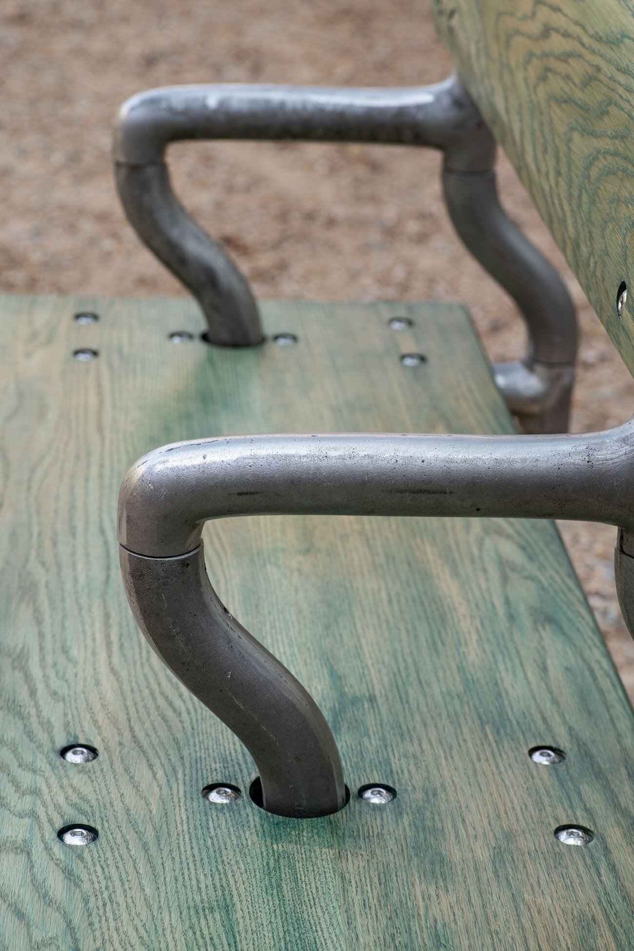 soft baroque's kinetic bench in spanish plaza sways and twists when you sit on it