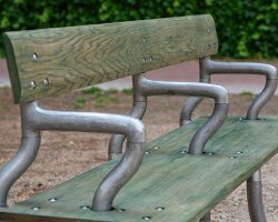 soft baroque's kinetic bench in spanish plaza sways and twists when you sit on it