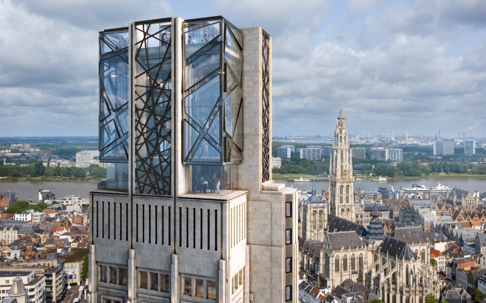 studio libeskind crowns art deco boerentoren tower with observatory overlooking antwerp