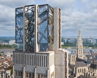 studio libeskind crowns art deco boerentoren tower with observatory overlooking antwerp