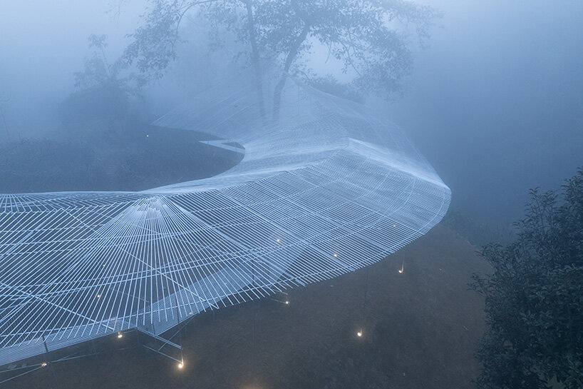 tea pavilion by kong xiangwei studio floats like a silver feather in chinese rainforest
