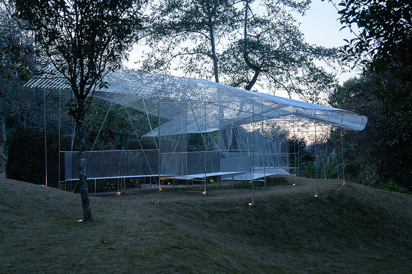 tea pavilion by kong xiangwei studio floats like a silver feather in chinese rainforest